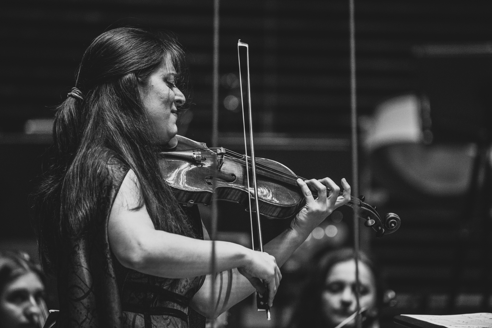 Close-up of Veriko playing her violin